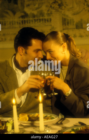 couple having romantic candlelit dinner for two Stock Photo