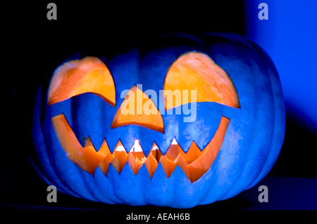 pumpkin blue eyes halloween moody scary dark dramatic orange pumpkin halloween jack o lantern moody dark scary evil halloween oc Stock Photo