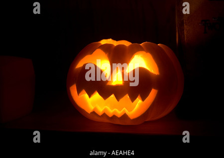 pumpkin blue eyes halloween moody scary dark dramatic orange pumpkin halloween jack o lantern moody dark scary evil halloween oc Stock Photo