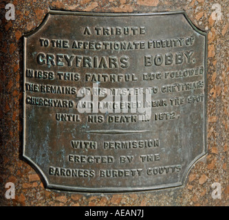 Memorial plaque on statue of Greyfriars Bobby . Old Town , Edinburgh , Scotland , U . K . , Europe . Stock Photo