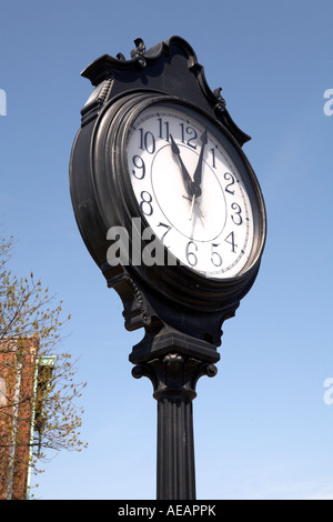 Black Outdoor commuter Clock sky Stock Photo