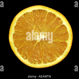 orange slice on solid black background Stock Photo