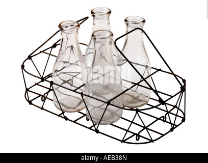 Milk Bottles in Wire Basket Stock Photo