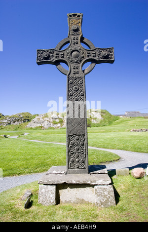 Replica of St Johns celtic Cross outside St Columbas shrine, Iona Abbey, Mull, Scotland, UK Stock Photo