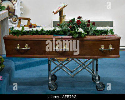 UK. A coffin resting in church the night before the funeral service Stock Photo