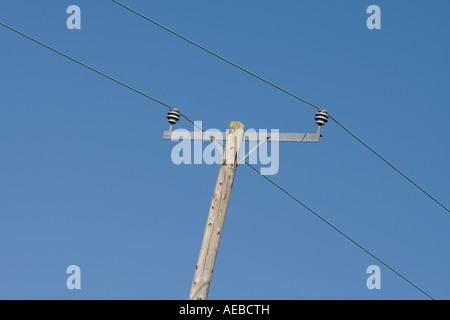 Overhead electricity cables on pole Stock Photo