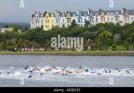 SWIMMERS TAKE PART IN THE THE ISLAND GAMES RAMSEY ISLES OF MAN Stock Photo