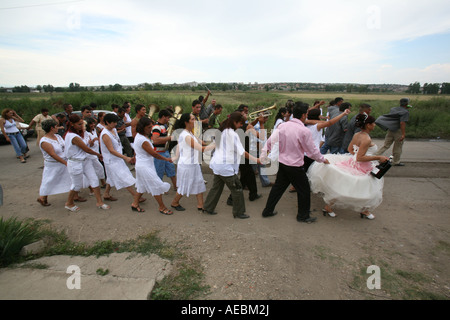 A gypsy wedding is based on music dance and lots of alcohol The bride and groom take their families into the streets and dance Stock Photo