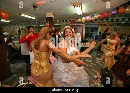 A gypsy wedding is based on music dance and lots of alcohol The bride and groom take their families into the streets and dance Stock Photo