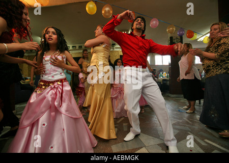 A gypsy wedding is based on music dance and lots of alcohol The bride and groom take their families into the streets and dance Stock Photo