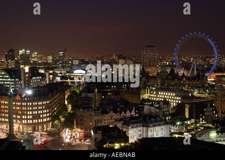 Night view of Londpn from the rooftops showing London Eye Nelson s Column Strand Trafalgar Square Charing Cross and beyond Stock Photo