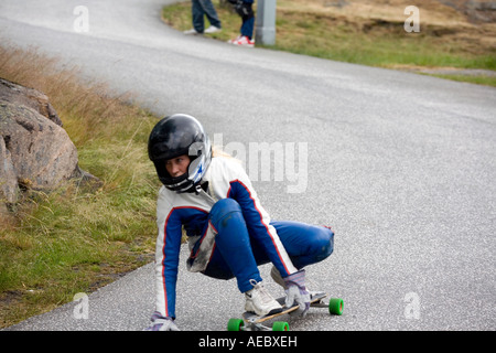 Anna member of Swedish skateboard team speeding down the race ground Stock Photo