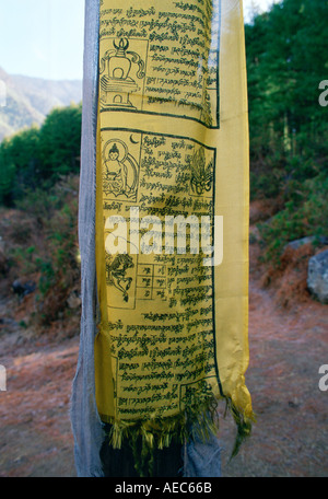Buddhist prayer flag on mountain path to Tak Tsang Monastery Bhutan Stock Photo