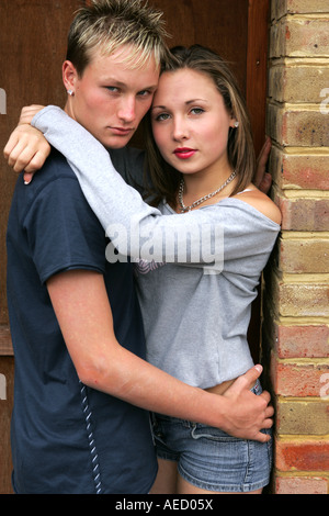 Teen couple cuddling Stock Photo - Alamy