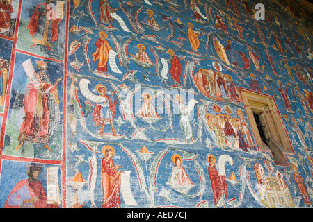 Frescoes on outside wall, Voronet Monastery, near Gura Humorului, Bucovina, Moldavia, Romania Stock Photo