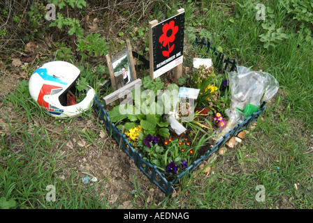 Roadside tributes to a girl killed in an accident involving a motorbike. Stock Photo