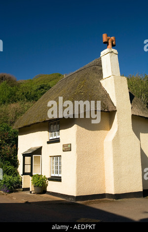 UK Devon Inner Hope Orchard Cottage thatched house in village square Stock Photo