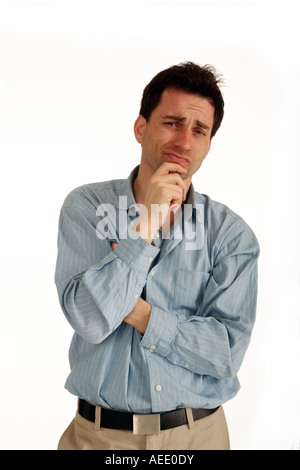 Young man looking confused Stock Photo