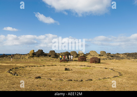 Toppled moai behind a ring of stones on Easter Island. Stock Photo