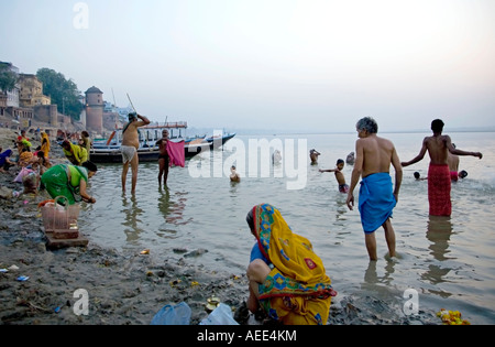 Ritual morning bath. Assi Ghat. Ganges river. Varanasi. India Stock Photo