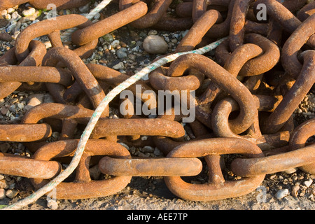 Rusty metal chain on the beach Stock Photo