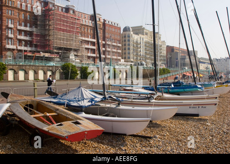 Yachts on the beach in Brighton Stock Photo