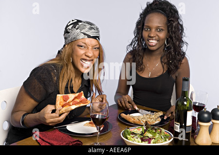 Two female friends having a meal. Stock Photo