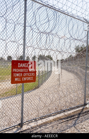 Perimeter fence with razor wire and electronic sensors at the Diagnostic and Evaluation Center Lincoln Nebraska USA Stock Photo