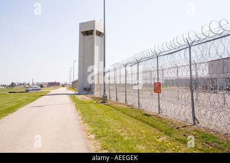 Perimeter fence and guard tower at the Lincoln Correctional Center Nebraska USA Stock Photo