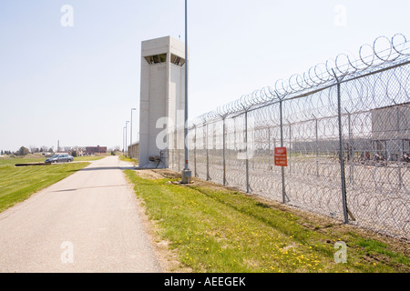 Perimeter fence and guard tower at the Lincoln Correctional Center ...