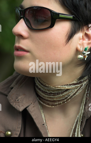 Young Woman Wearing Sunglasses Stock Photo
