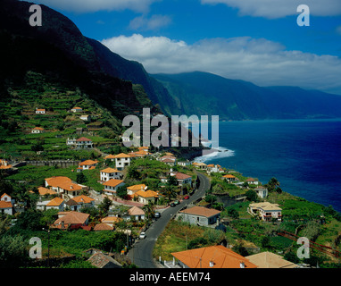 road along the northern coast at the village fo Seixal at the north coast of Madeira Portugal Europe. Photo by Willy Matheisl Stock Photo