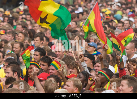 Fans of the Ghanaian national football team waving their flags before the world cup match Brazil vs Ghana (3:0). Stock Photo