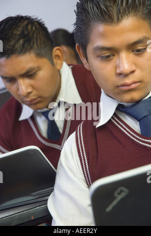 Students at the Técnica 156 Lic Ignacio Garcia Tellez middle school in Malinalco State of Mexico Mexico use low cost computers Stock Photo