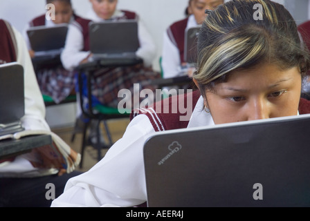 Students at the Técnica 156 Lic Ignacio Garcia Tellez middle school in Malinalco State of Mexico Mexico use low cost computers Stock Photo