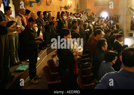 Shanghai China A full congregation attends the Sunday morning service at the Mu en Catholic Church in central Shanghai Stock Photo