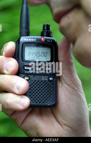 man using a two way commumications radio Stock Photo