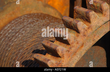 Rusty cog wheel and wire Stock Photo