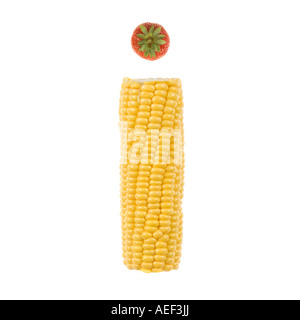 The letter I on a pure white background using sweet corn and a strawberry. Stock Photo