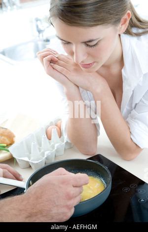 couple making breakfast Stock Photo