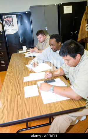 Inmates studying for GED as well as college classes at the Omaha Correctional Center Omaha Nebraska USA Stock Photo