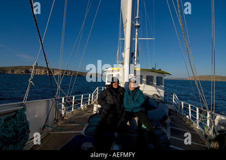 adventure travelers on the sailboat Golden Fleece leaving the Falkland Islands for the western Antarctic peninsula in Antarctica Stock Photo