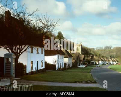 UK Dorset Milton Abbas village grey painted K6 phone box in main street Stock Photo