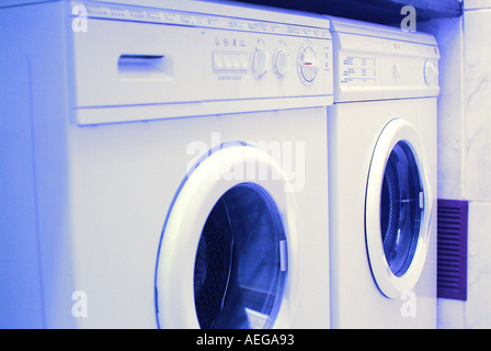 Sweet Home home service area duotone blue blueish white machines machine dryer electric electronic appliances household utilitie Stock Photo