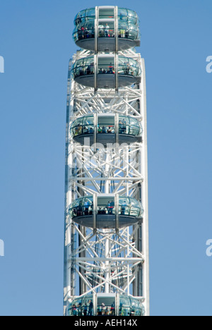 Vertical close up of the top capsules on the London Eye, aka Millennium Wheel against a bright blue sky Stock Photo