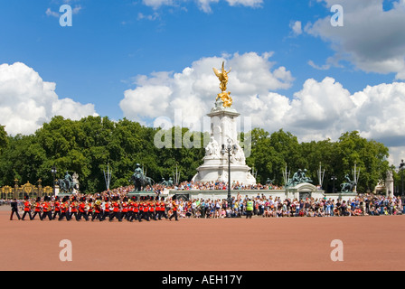 Horizontal wide angle of the traditional 'Changing of the Guard' parade infront of Buckingham Palace on a sunny day Stock Photo