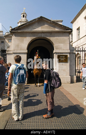 Vertical portrait of a female member of the Household Cavalry mounted outside Horse Guards Parade on Whitehall on a sunny day Stock Photo