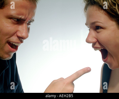 Expressions  person woman blond profiles boyfriend girlfriend accusing accuse accusation Stock Photo