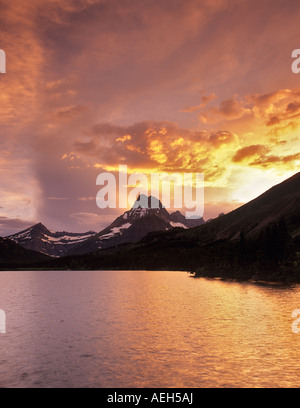 Sunset on Swiftcurrent Lake with Mount Wilbur Glacier National Park Montana Stock Photo