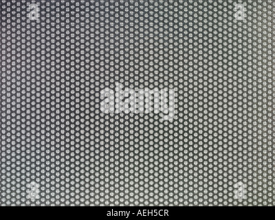 Thin sheet of metal sheet with holes. Stock Photo